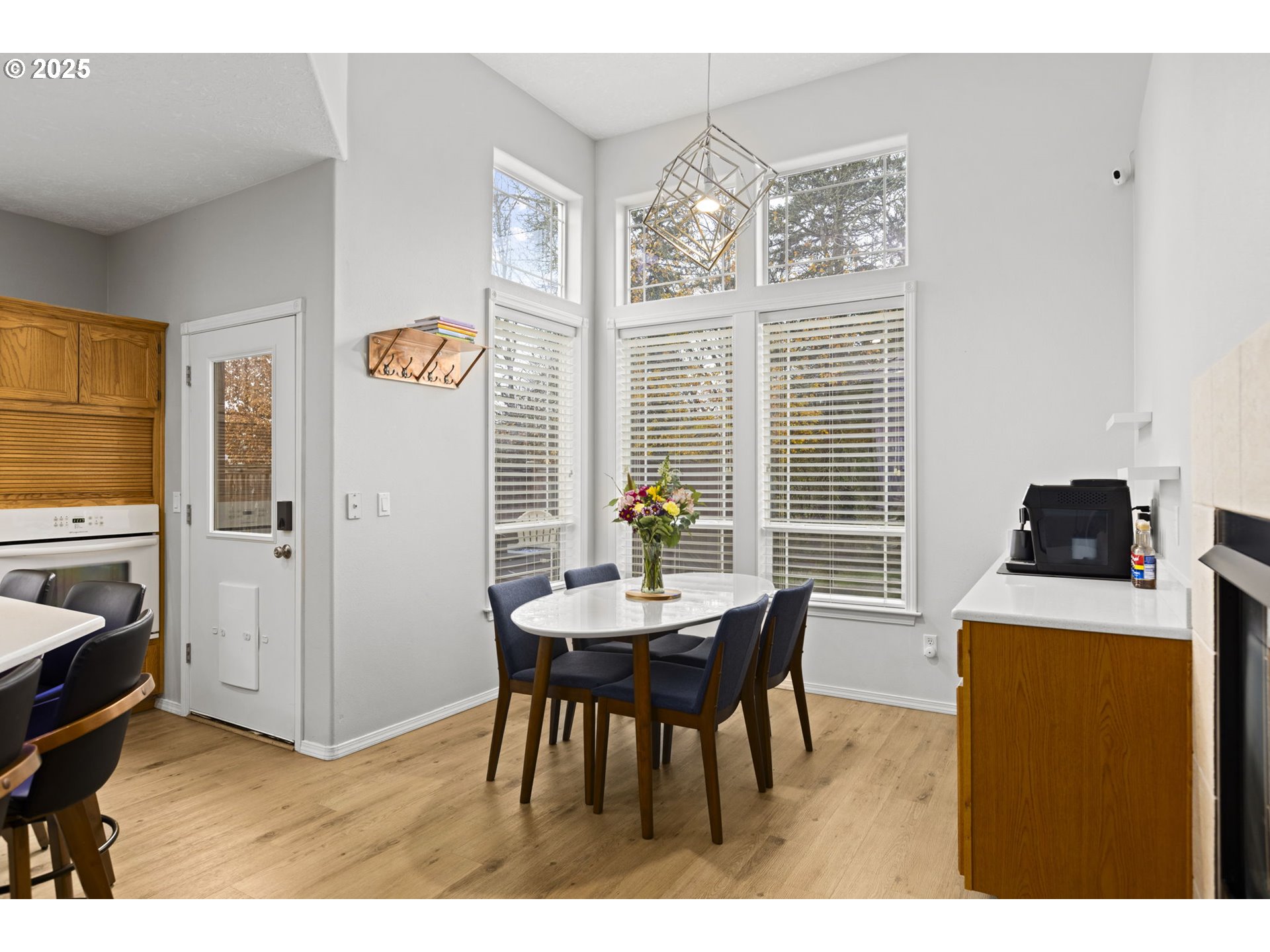 1249 Southeast Williams Avenue Gresham, OR 97080 - Photo 18 of 38 a view of a dining room with furniture and a window