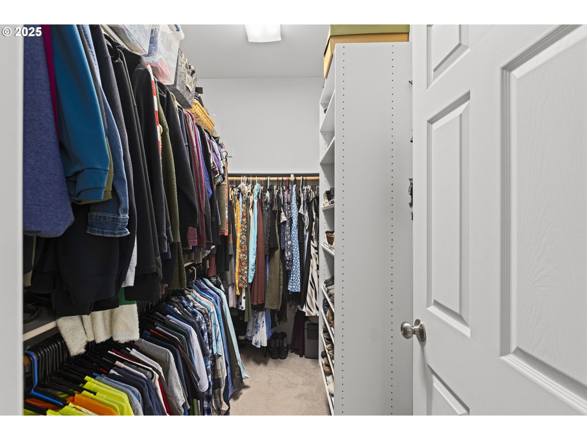 1249 Southeast Williams Avenue Gresham, OR 97080 - Photo 25 of 38 a view of walk in closet with clothes and shoes