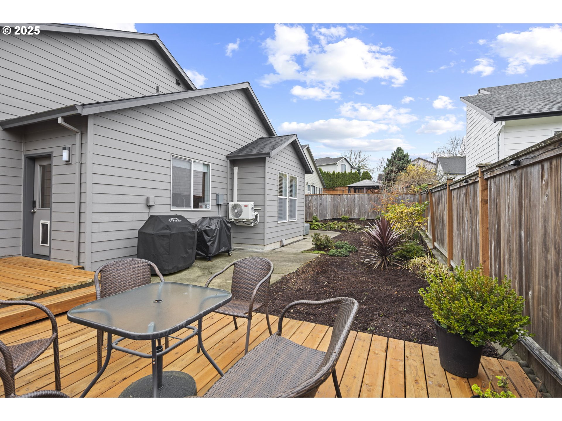 1249 Southeast Williams Avenue Gresham, OR 97080 - Photo 34 of 38 a view of a chairs and table in the patio