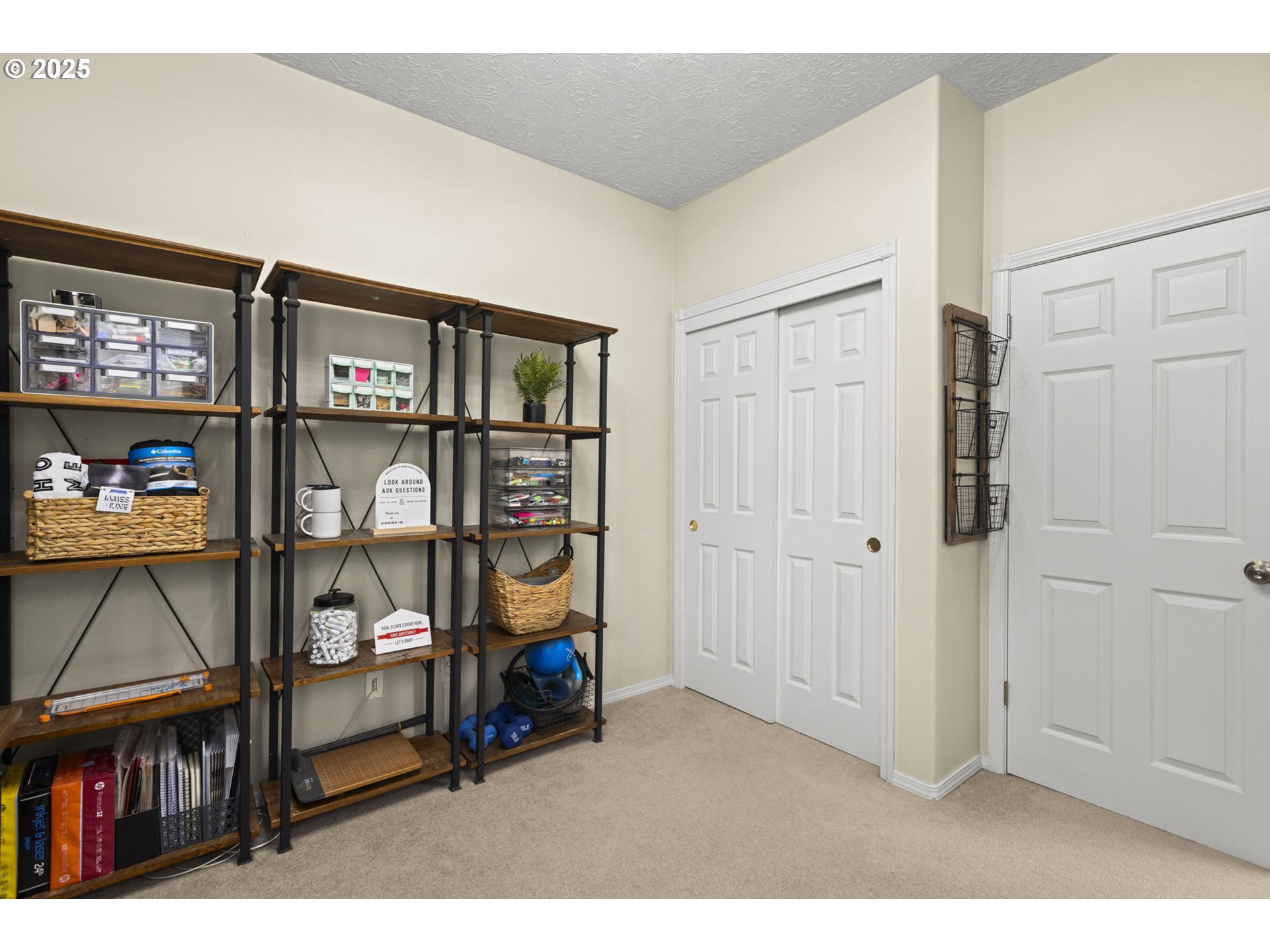 1249 Southeast Williams Avenue Gresham, OR 97080 - Photo 10 of 38 a living room with lots of furniture and a bookshelf