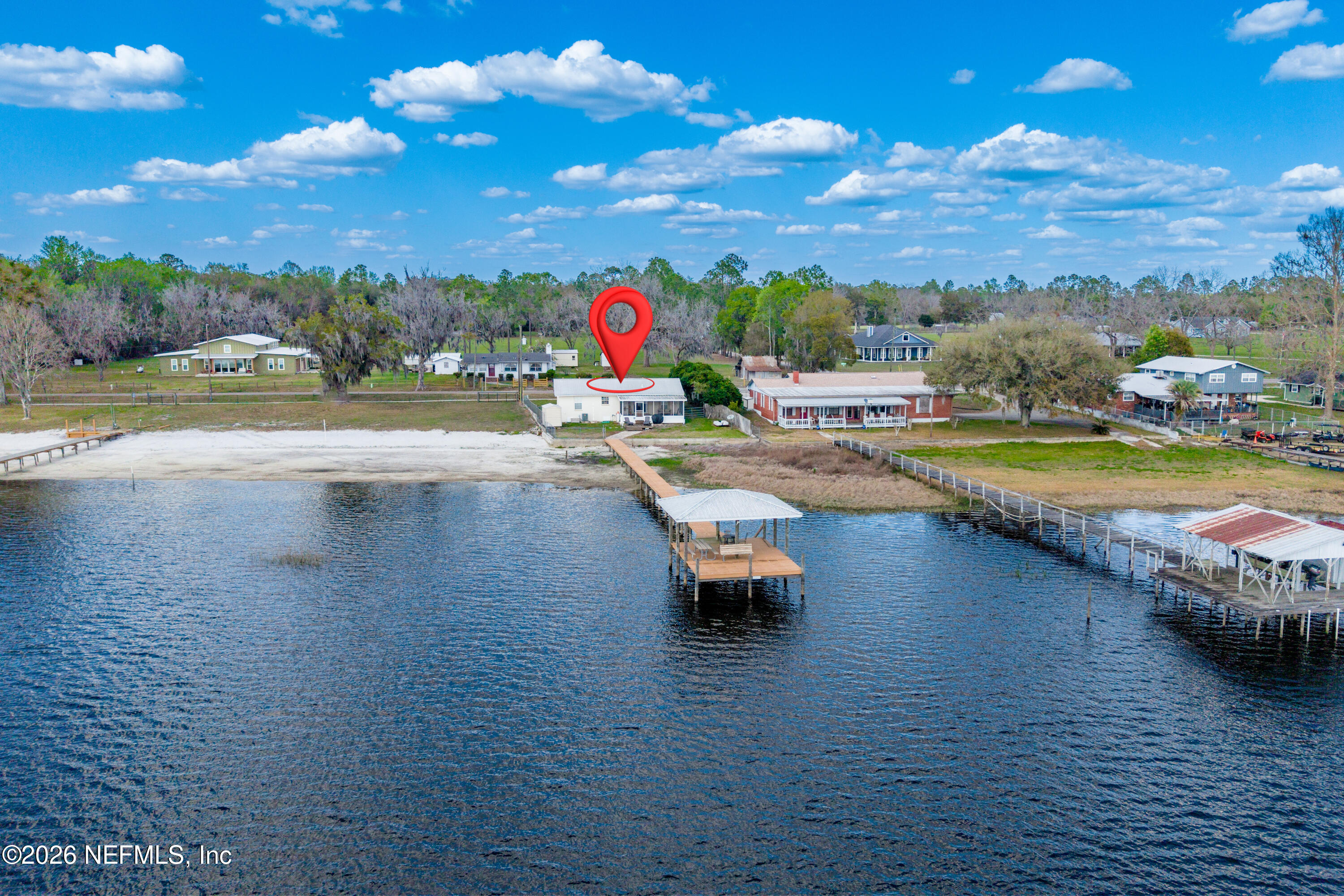 7932 Southwest County Road 18 Hampton, FL 32044 - Photo 1 of 39 a view of swimming pool with outdoor seating