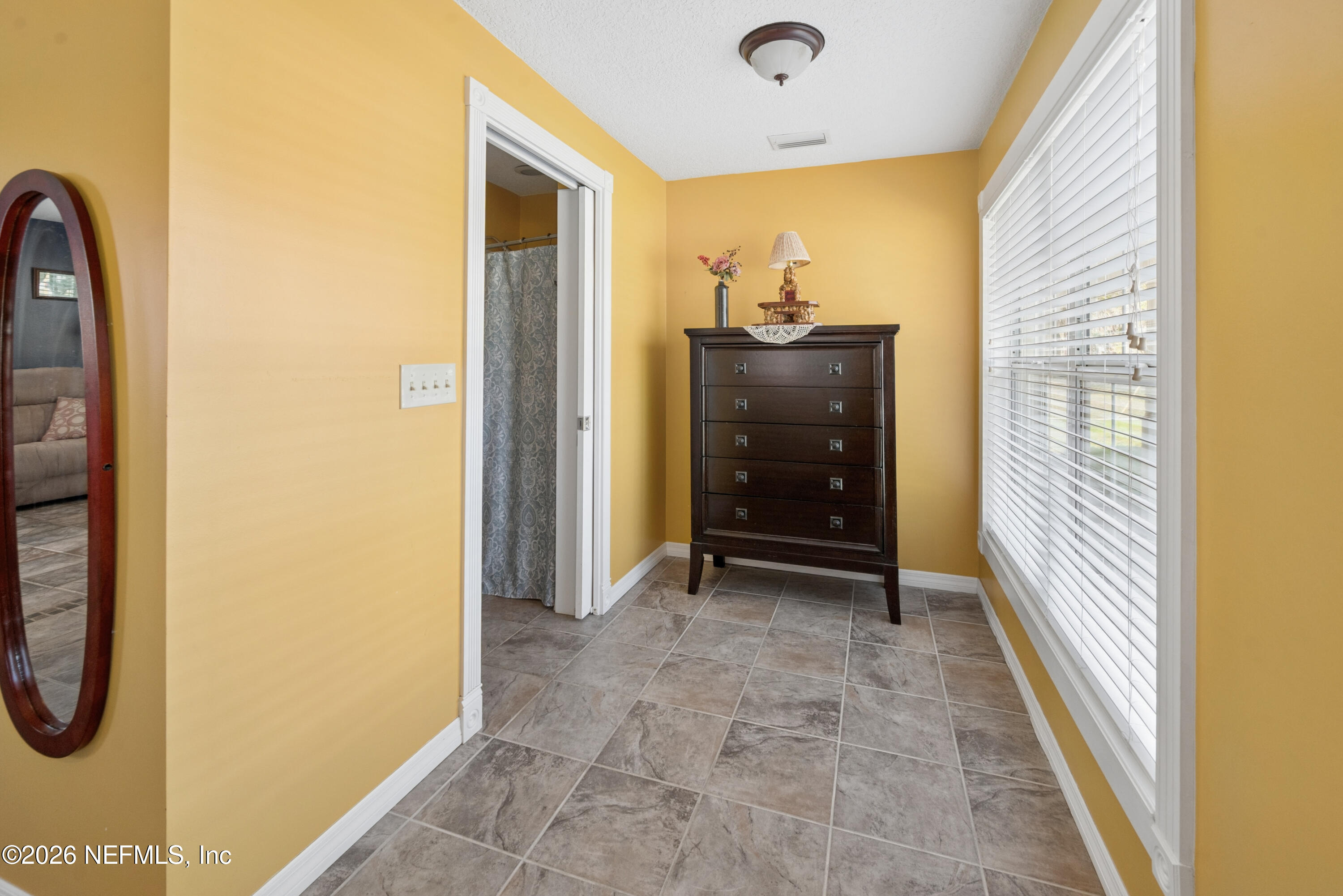 7932 Southwest County Road 18 Hampton, FL 32044 - Photo 14 of 39 a view of walk in closet with clothes and shoes