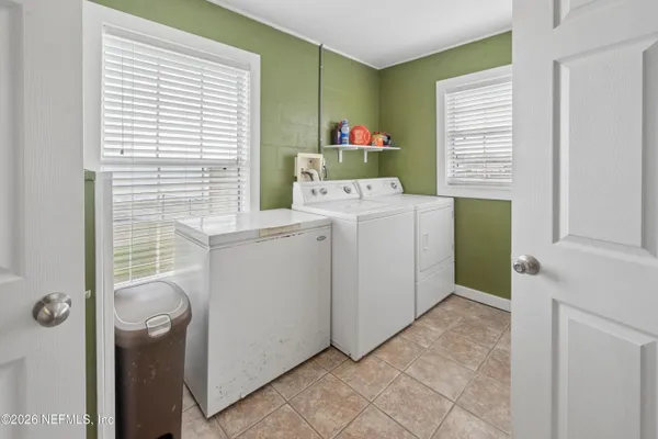 a view of a hallway with front door