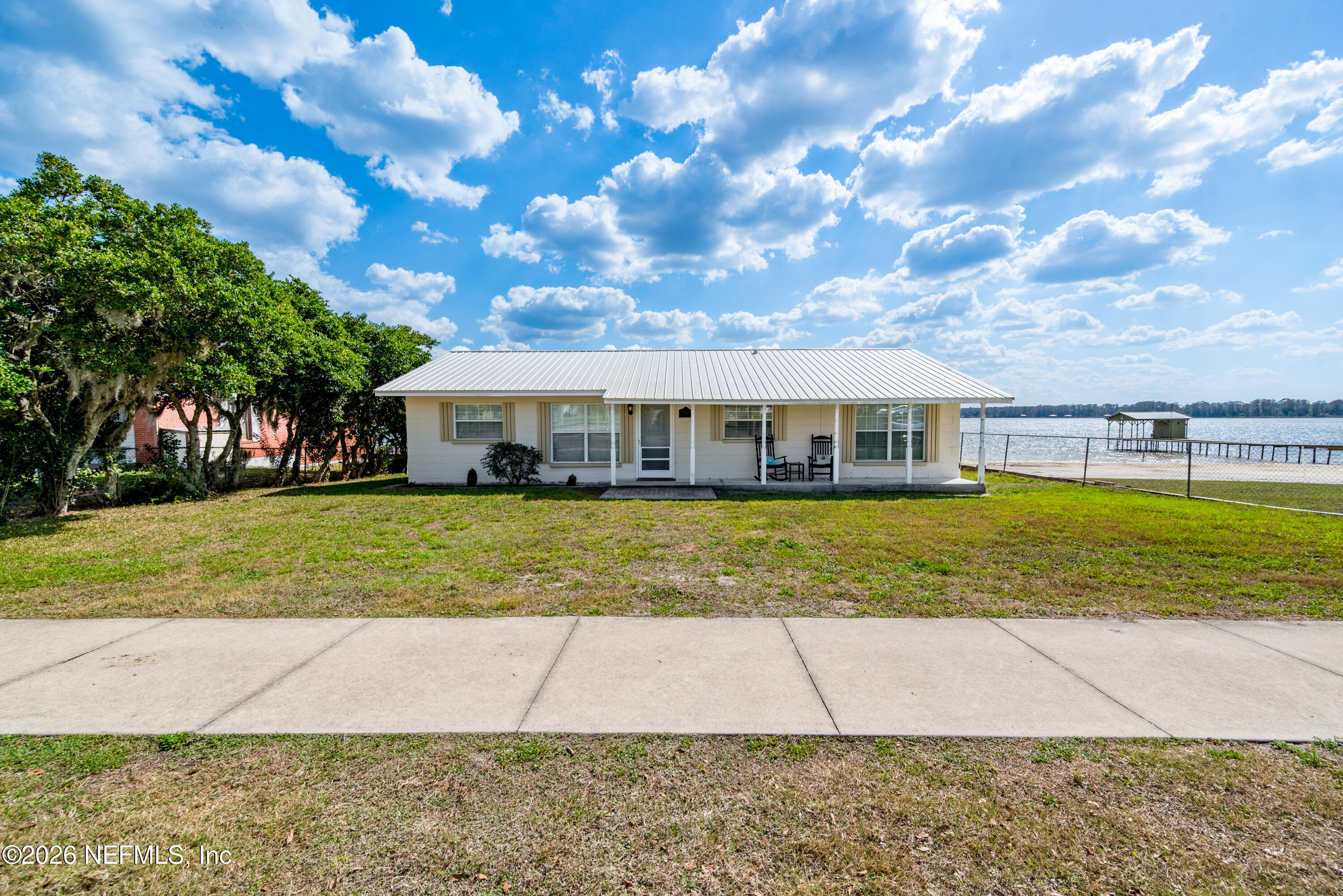 7932 Southwest County Road 18 Hampton, FL 32044 - Photo 6 of 39 a view of a house with a swimming pool