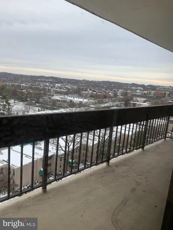 a view of balcony with city