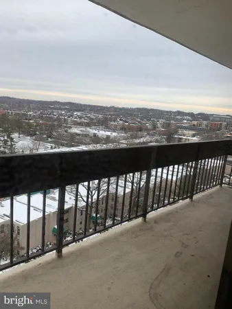 a view of balcony with city