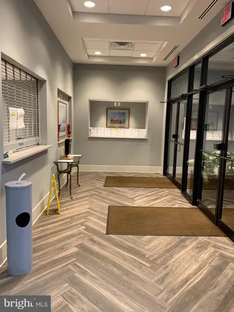 a bedroom with a bed and a table in it