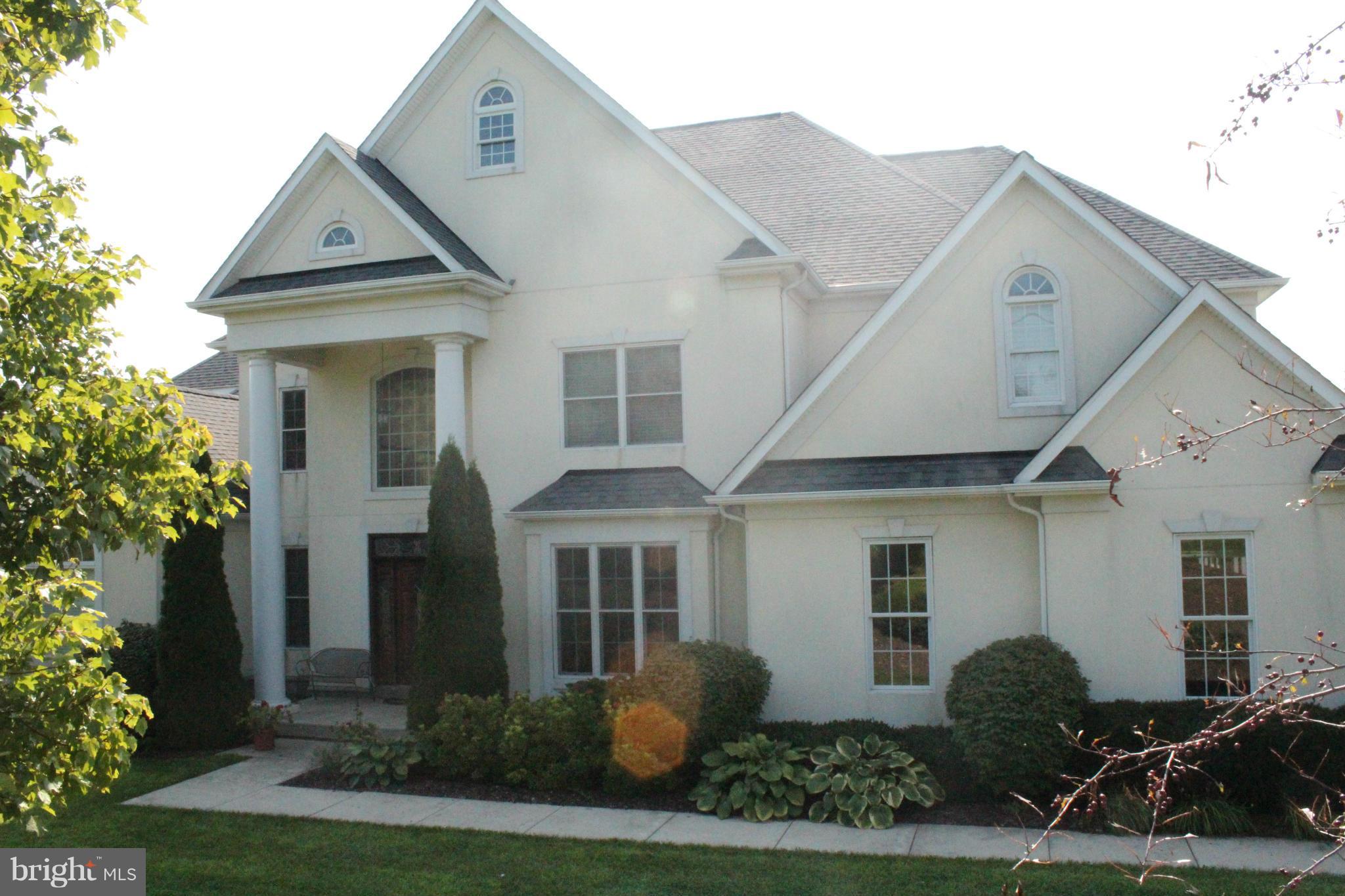 553 Houck Road Westminster, MD 21157 - Photo 2 of 30 a front view of a house with garden