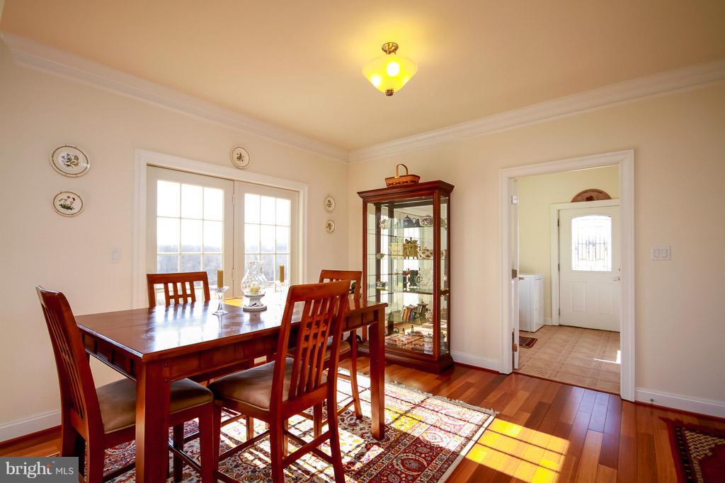 553 Houck Road Westminster, MD 21157 - Photo 11 of 30 a view of a dining room with furniture and window
