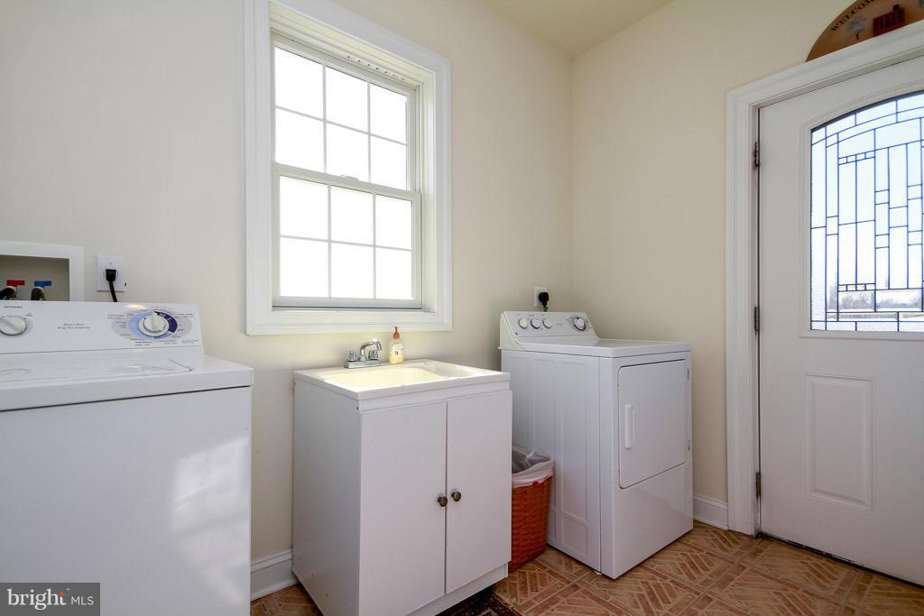 553 Houck Road Westminster, MD 21157 - Photo 12 of 30 a utility room with dryer and washer