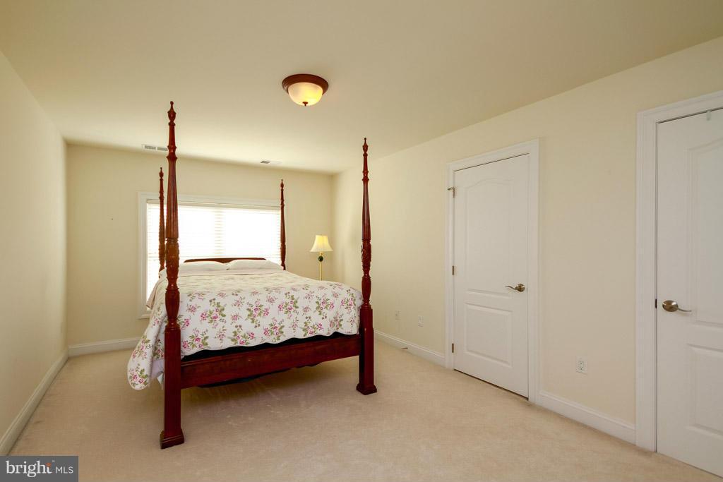 553 Houck Road Westminster, MD 21157 - Photo 23 of 30 a bedroom with a bed and a closet