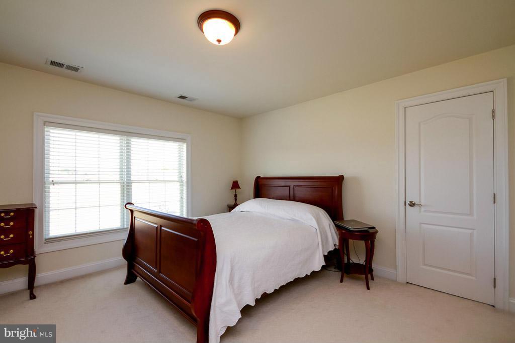 553 Houck Road Westminster, MD 21157 - Photo 24 of 30 a bedroom with a bed and a window