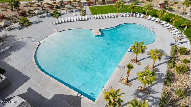 a view of a swimming pool with a lake view