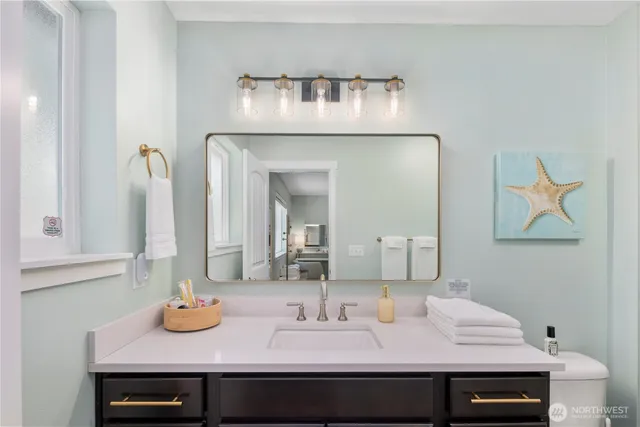 a bathroom with a shower and a tub