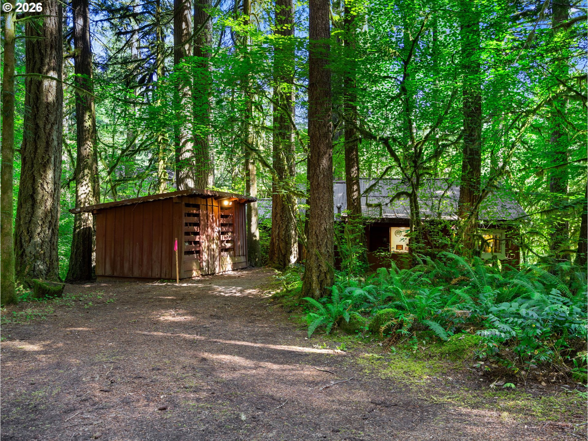 26811 East Road 15 Rhododendron, OR 97049 - Photo 36 of 47 a view of a house with large trees