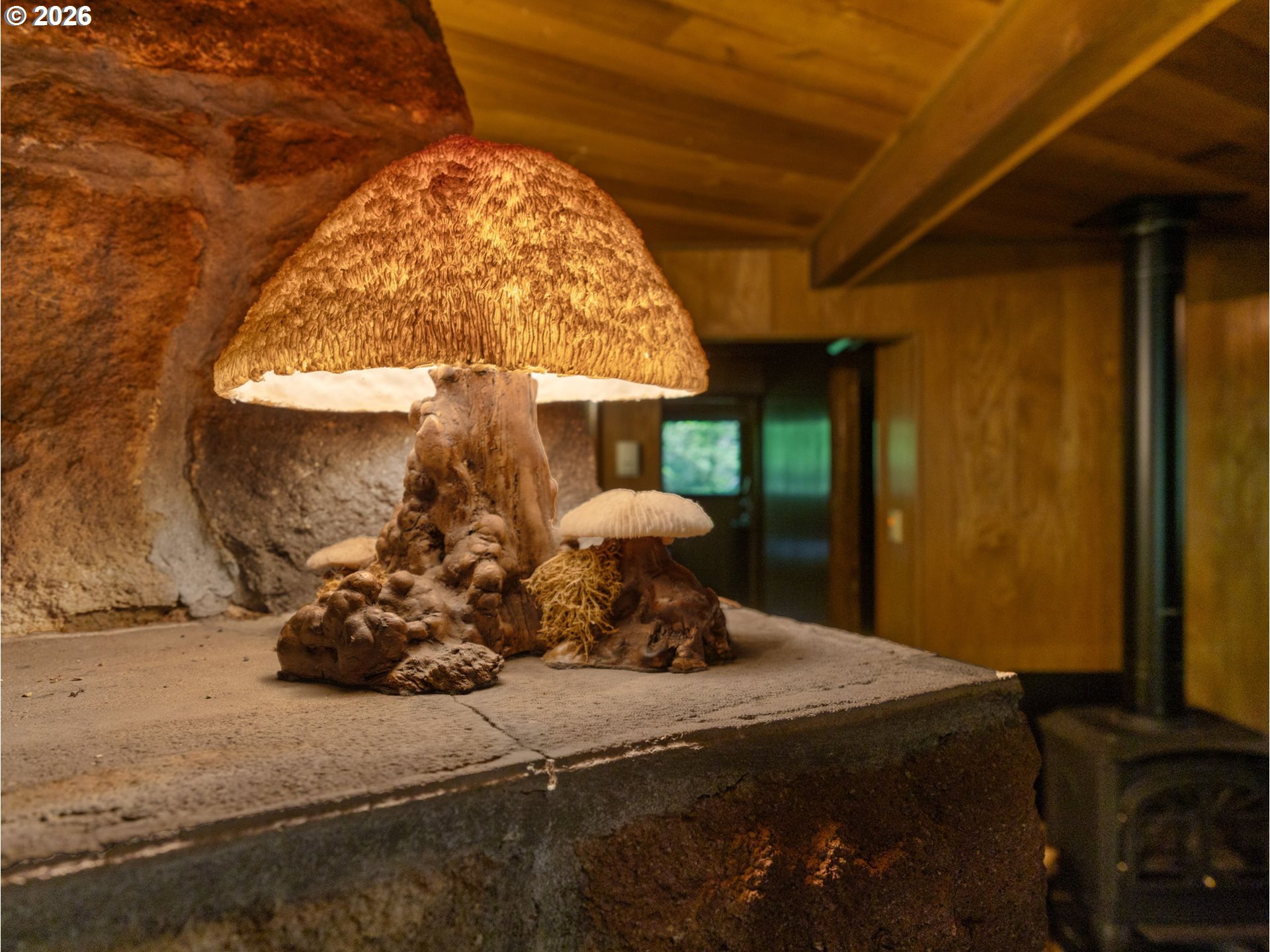 26811 East Road 15 Rhododendron, OR 97049 - Photo 5 of 47 a vase of flowers sitting on a table