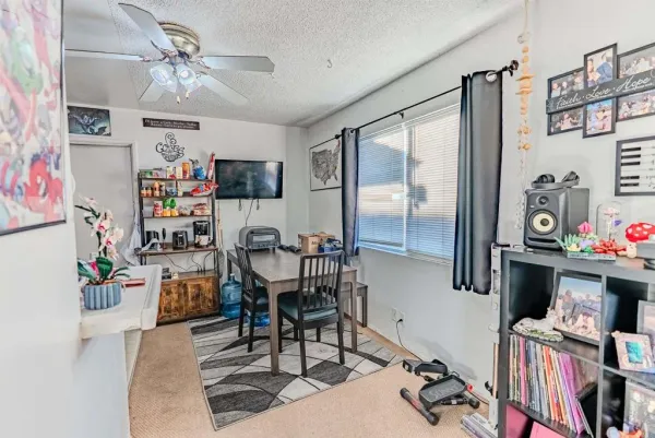 a kitchen with stainless steel appliances a stove a sink and a refrigerator