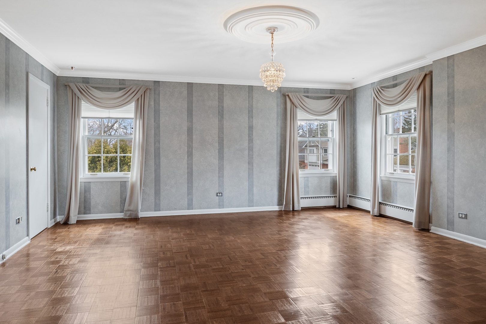 921 Pontiac Road Wilmette, IL 60091 - Photo 17 of 40 a view of livingroom with hardwood floor and window