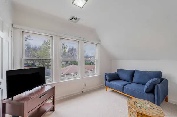 a room with furniture and a window