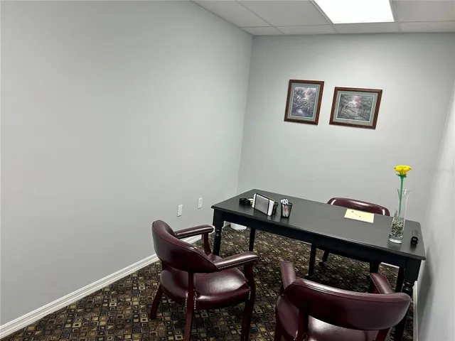 a view of a livingroom with furniture