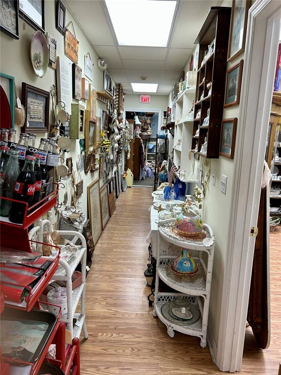 208 West Main Street Wauchula, FL 33873 - Photo 5 of 36 a view of walk in closet with clothes and shoes