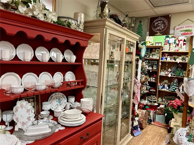 a table in a room next to a store