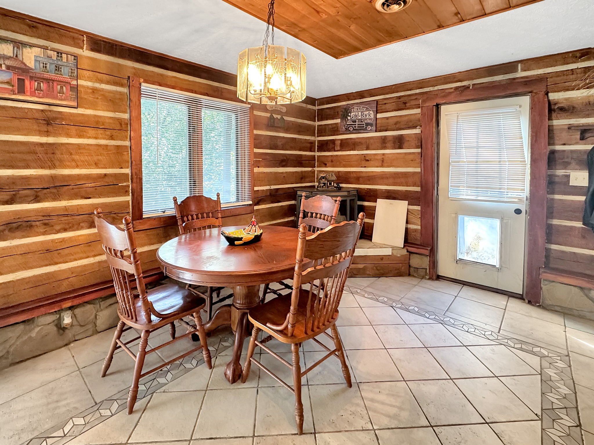 480 Hickman Shores Road Dover, TN 37058 - Photo 11 of 39 a view of a dining room with furniture and chandelier