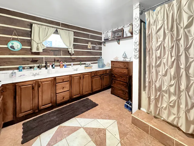 a kitchen with stainless steel appliances granite countertop a stove and a sink