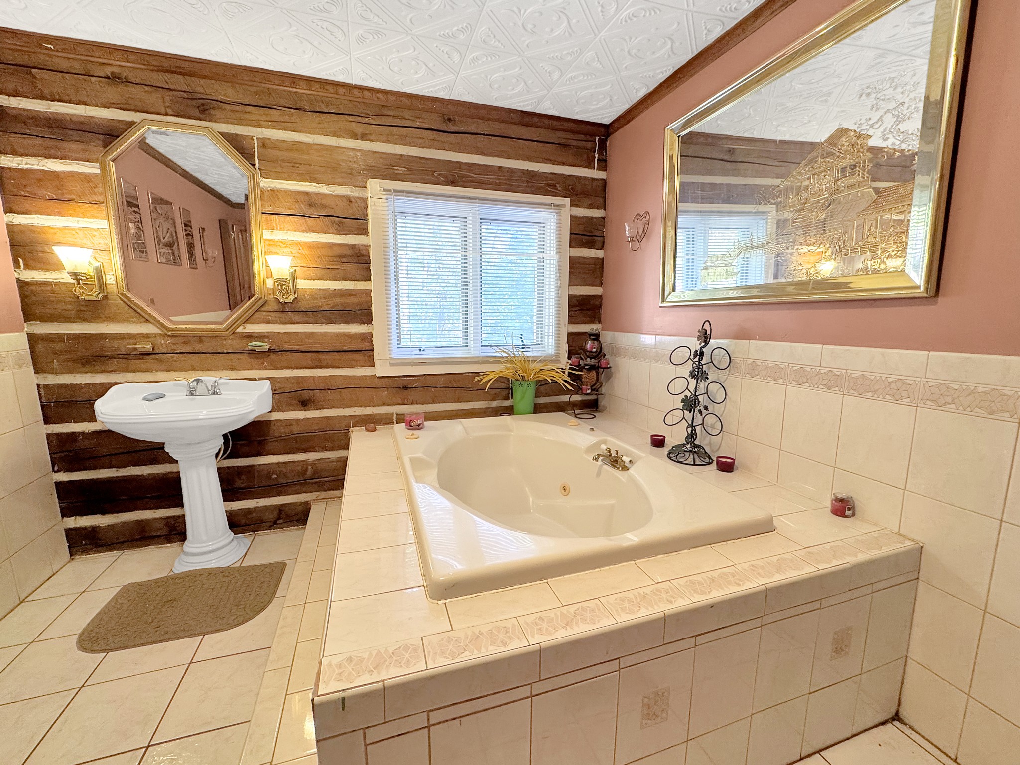 480 Hickman Shores Road Dover, TN 37058 - Photo 17 of 39 a bathroom with a bathtub and a sink