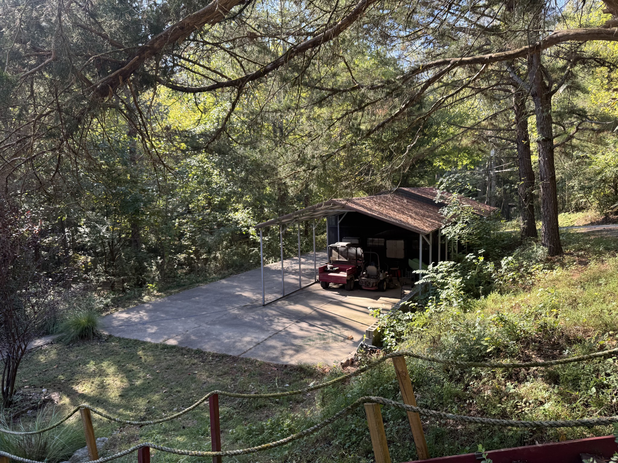 480 Hickman Shores Road Dover, TN 37058 - Photo 30 of 39 a backyard of a house with table and chairs