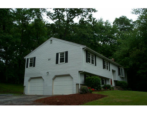 37 Old Bolton Road Hudson, MA 01749 - Photo 1 of 1 a view of house and outdoor space with yard