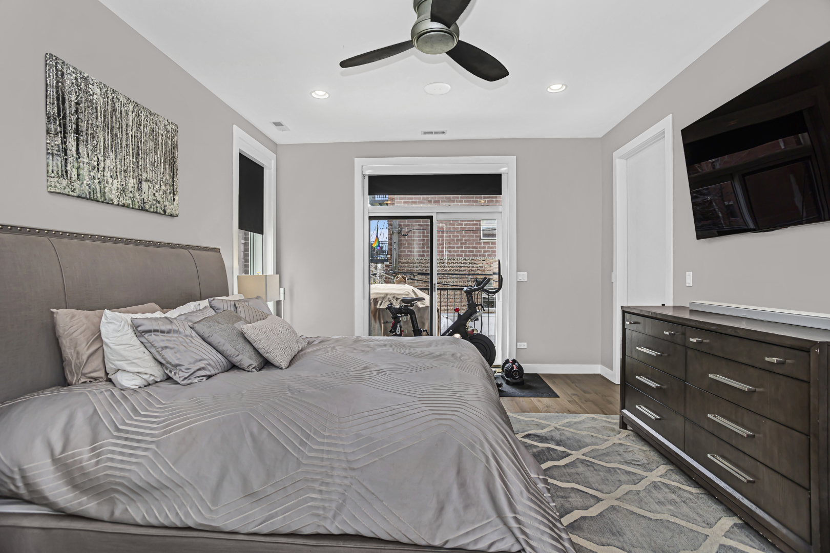 2301 West Wolfram Street, Unit 2 Chicago, IL 60618 - Photo 14 of 26 a bedroom with a bed and a dresser