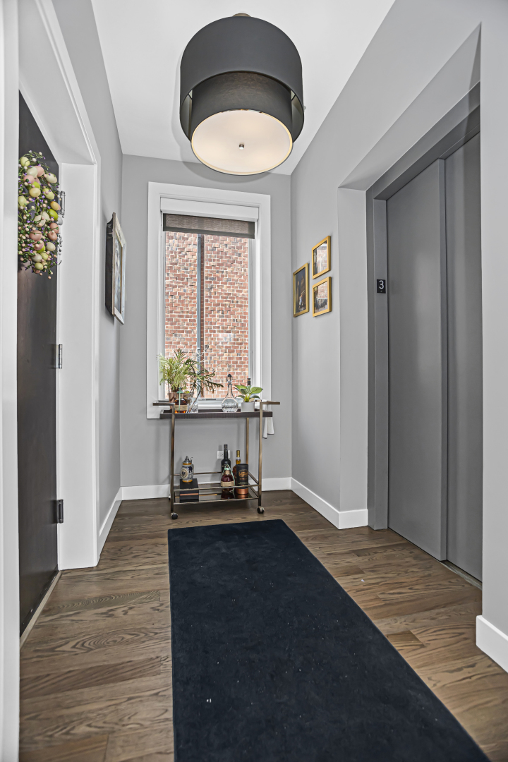 2301 West Wolfram Street, Unit 2 Chicago, IL 60618 - Photo 2 of 26 a bedroom with a bed and a window