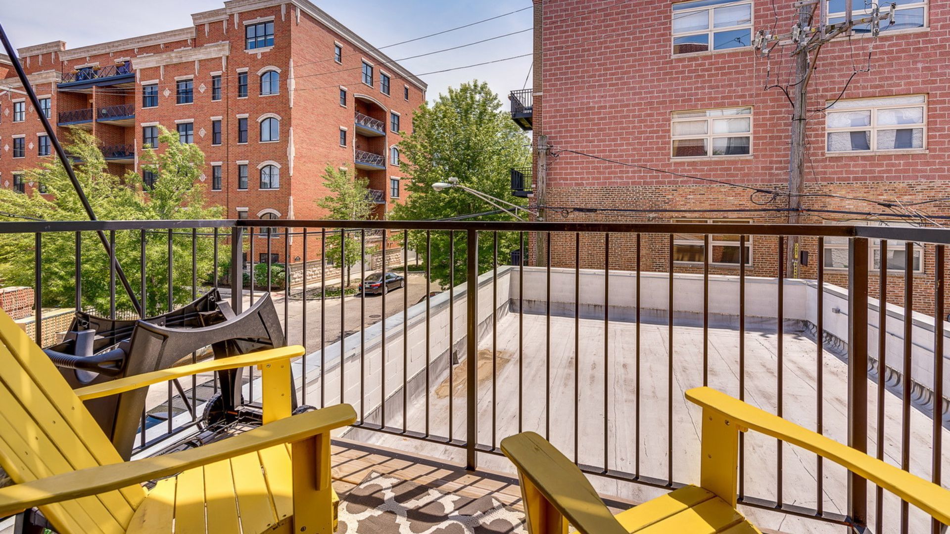 2301 West Wolfram Street, Unit 2 Chicago, IL 60618 - Photo 25 of 26 a view of a building from a balcony