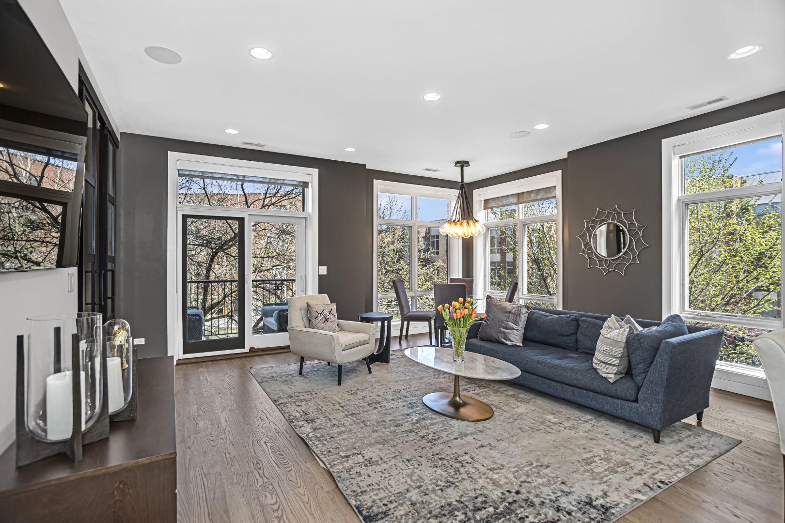 2301 West Wolfram Street, Unit 2 Chicago, IL 60618 - Photo 3 of 26 a living room with furniture and a flat screen tv