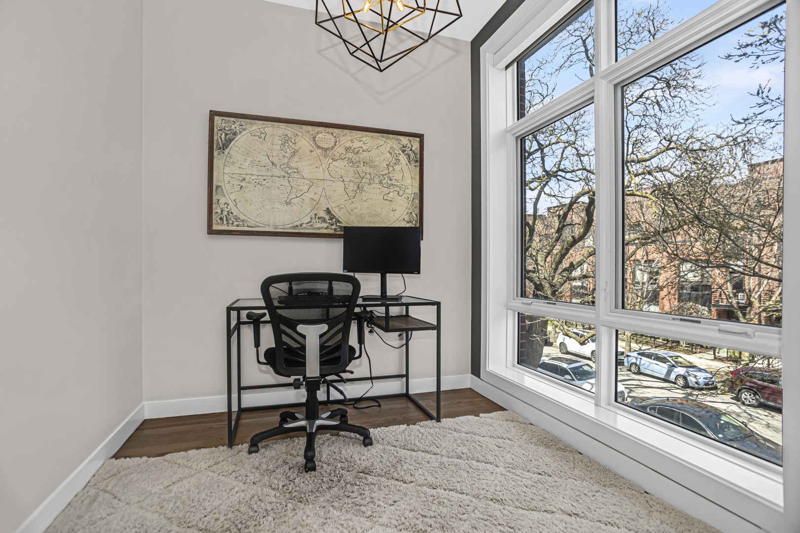 2301 West Wolfram Street, Unit 2 Chicago, IL 60618 - Photo 7 of 26 a view of a workspace with furniture and a window