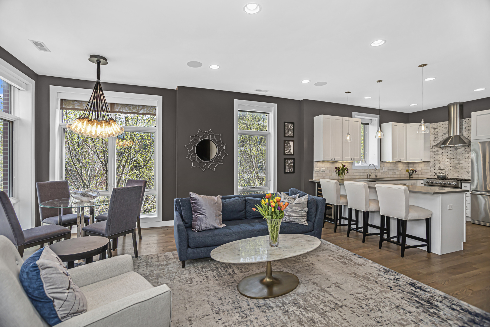 2301 West Wolfram Street, Unit 2 Chicago, IL 60618 - Photo 9 of 26 a living room with furniture and kitchen view