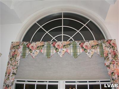 870 Benner Road Allentown, PA 18104 - Photo 23 of 66 Circletop window in Formal Living Room allows for