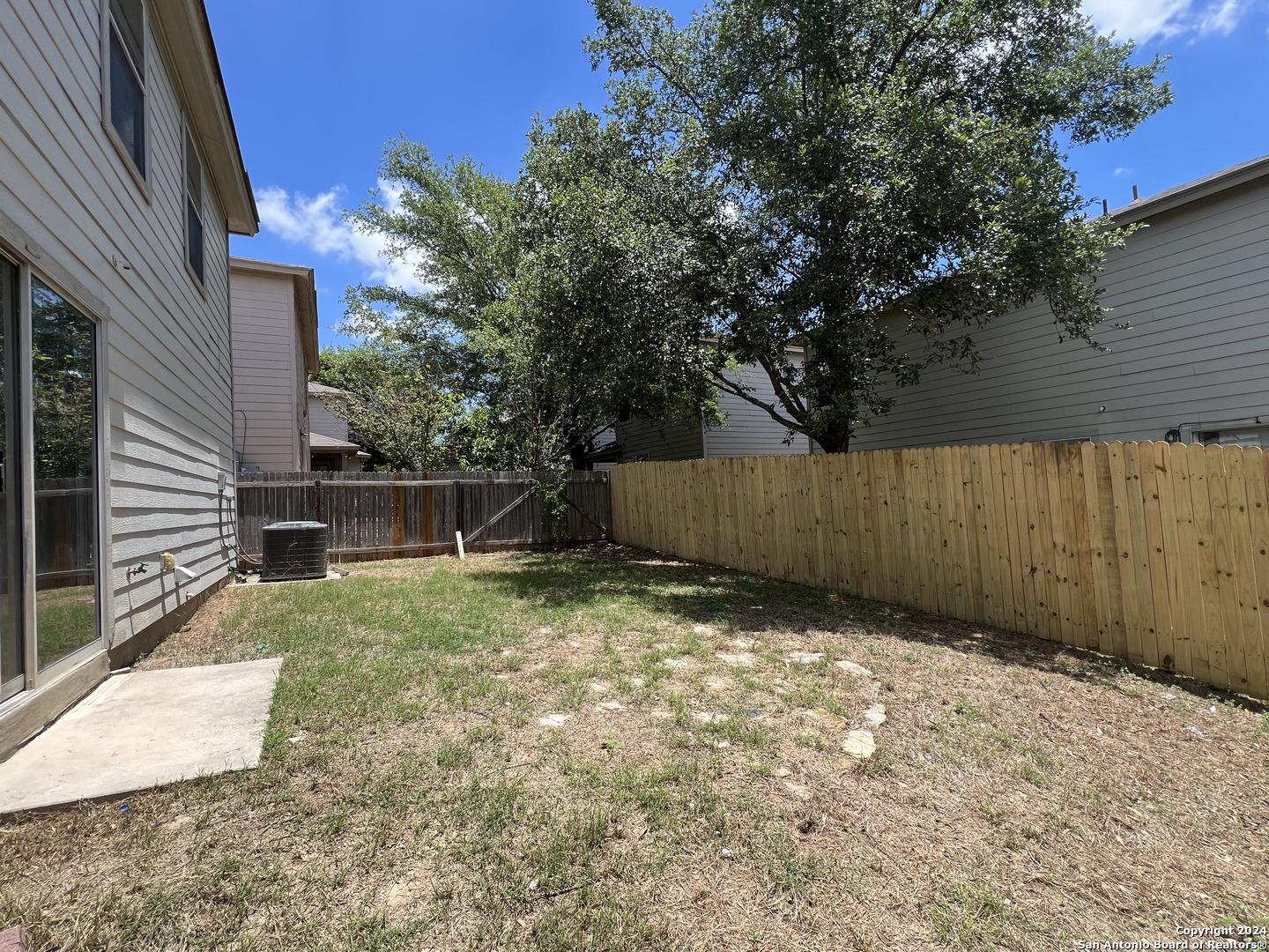 10118 Figaro San Antonio, TX 78260 - Photo 16 of 20 a backyard of a house