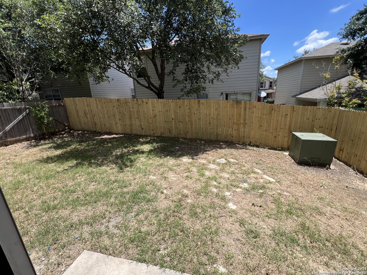 10118 Figaro San Antonio, TX 78260 - Photo 17 of 20 a view of a backyard