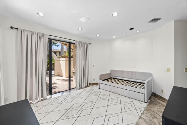 7339 Mandarin Drive Boca Raton, FL 33433 - Photo 15 of 47 a bedroom with a bed and a window