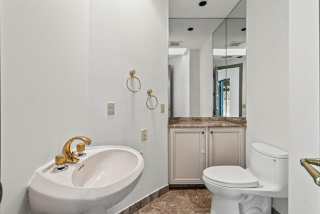 7339 Mandarin Drive Boca Raton, FL 33433 - Photo 20 of 47 a bathroom with a sink a toilet and shower