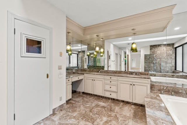 7339 Mandarin Drive Boca Raton, FL 33433 - Photo 23 of 47 a large bathroom with a granite countertop double vanity and a mirror