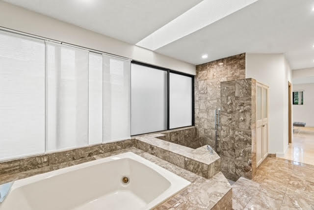 7339 Mandarin Drive Boca Raton, FL 33433 - Photo 26 of 47 a bathroom with a bathtub and shower