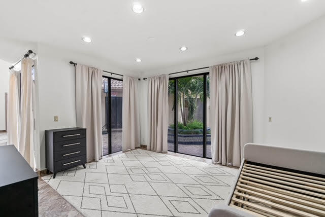 7339 Mandarin Drive Boca Raton, FL 33433 - Photo 27 of 47 a bedroom with a bed and a dresser