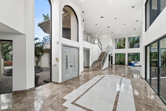 7339 Mandarin Drive Boca Raton, FL 33433 - Photo 3 of 47 a view of entryway and hall