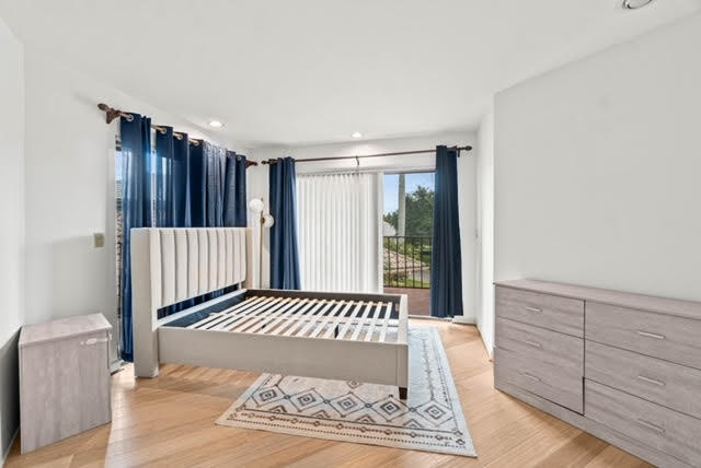 7339 Mandarin Drive Boca Raton, FL 33433 - Photo 33 of 47 a view of a room with wooden floor and a rug