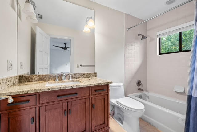 7339 Mandarin Drive Boca Raton, FL 33433 - Photo 34 of 47 a bathroom with a granite countertop sink toilet and shower