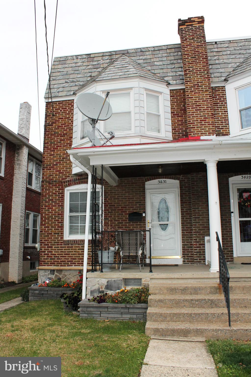 a view of a building with a porch