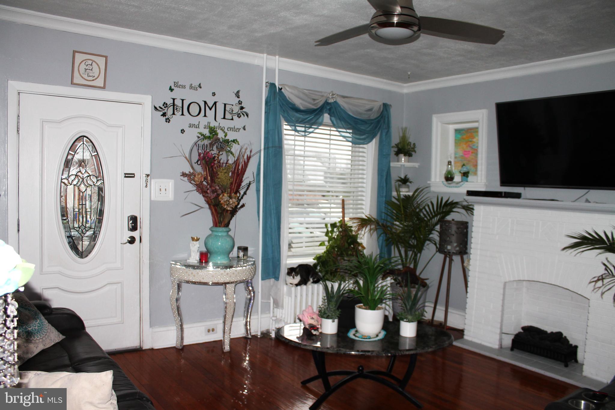 3431 Fairfield Street Reading, PA 19605 - Photo 4 of 15 a living room with furniture and a flat screen tv